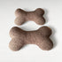 Hundekissen in Knochenform aus Boucléstoff in braun