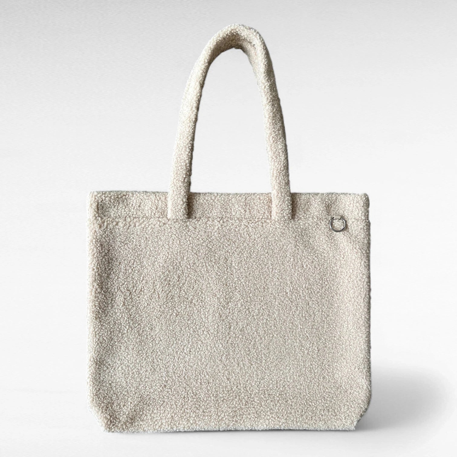 Rechteckiger Shopper aus Teddyfell in Farbe beige mit neutralem Hintergrund