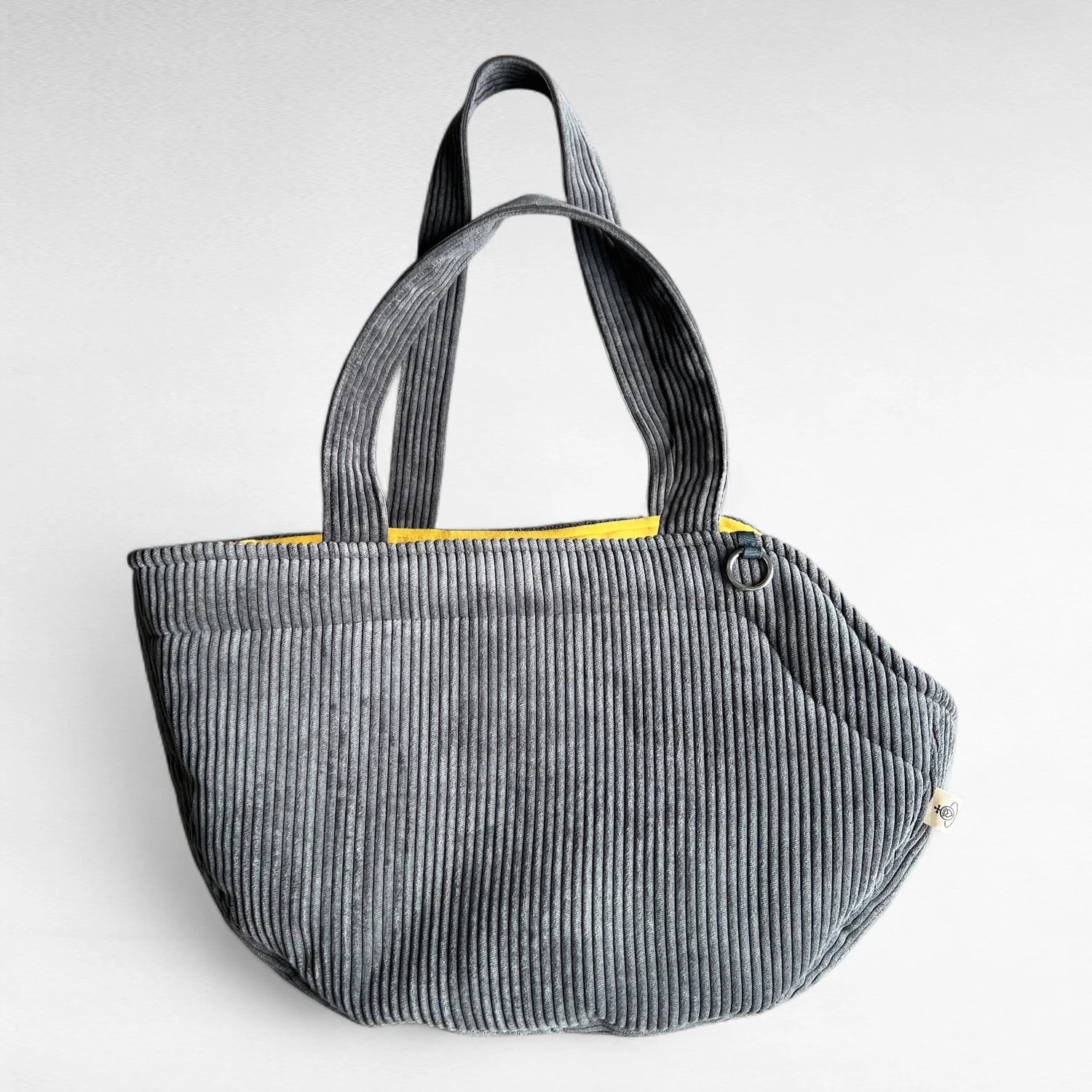 Halbrunde Hundetasche für Hunde bis 5 kg aus dunkelgrauem Cord mit Kontrast Sweatstoff-Futter in Farbesenf mit 2 Tragegurten aus Cordstoff