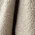 Premium Bouclé Stoff Farbe beige in Nahaufnahme
