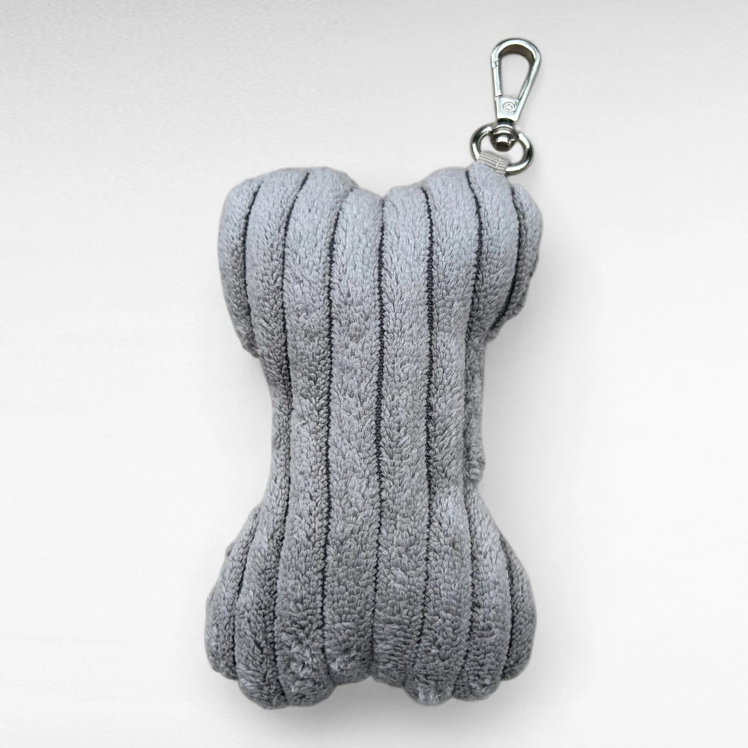 Deko Taschenanhänger in Knochenform aus grauem Breitcord mit kleinem Karabiner