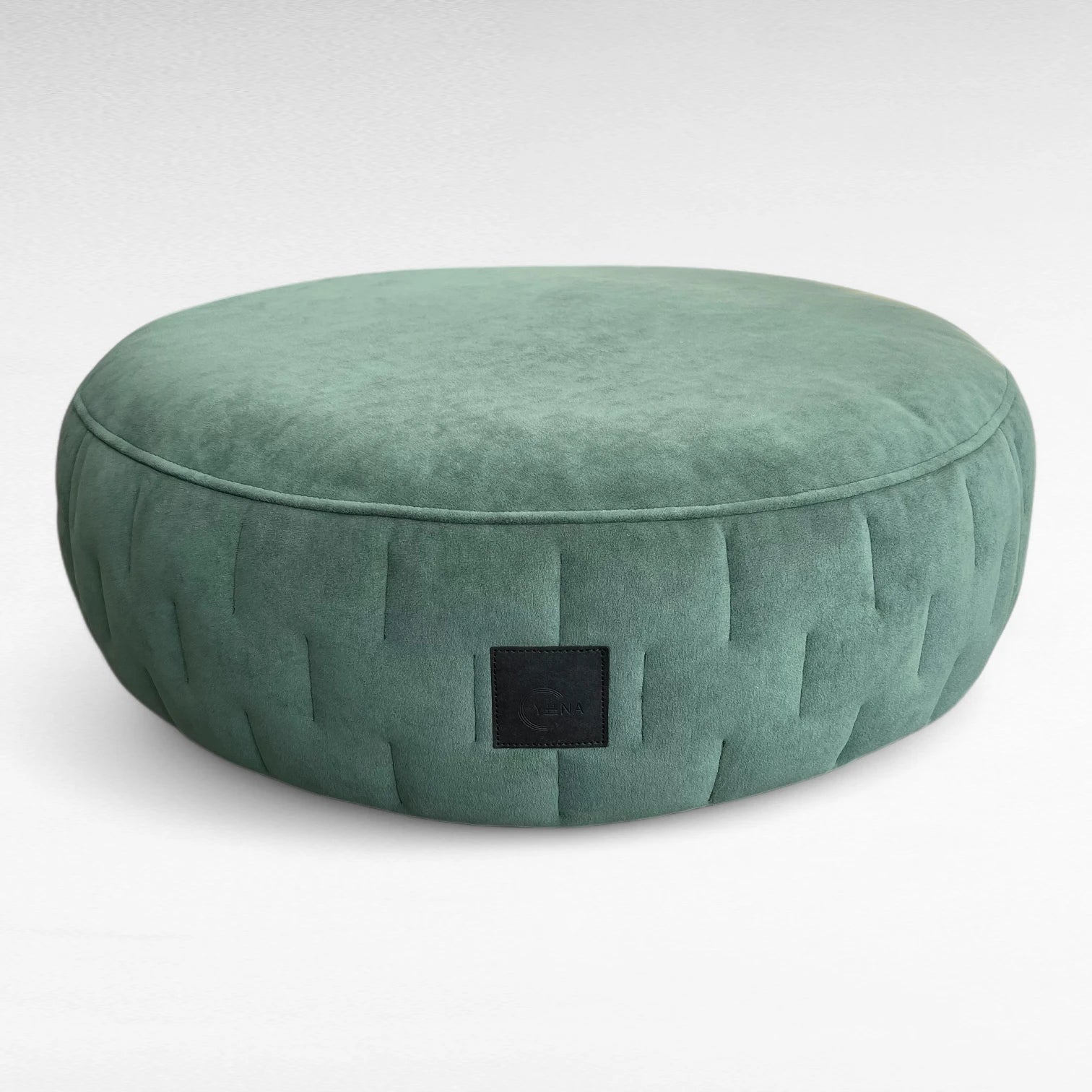 Rundes orthopädisches Hundebett in Farbe smaragdgrün aus Veloursstoff mit seitlicher Designsteppung
