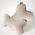 Hundekissen in Knochenform aus Boucléstoff in beige