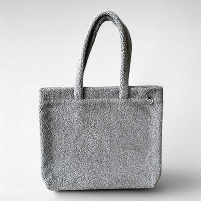 Rechteckiger Teddy Shopper in Farbe grau mit neutralem Hintergrund